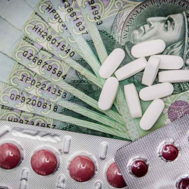 white oval medication pill beside blister pack
